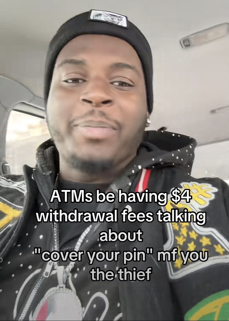 Selfie picture of a driver with the caption: ATMs be having $4
withdrawal fees talking about
'"cover your pin" mf you the thief.