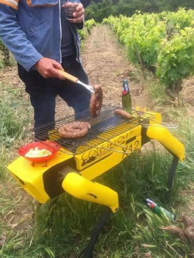 Boston Dynamics Spot robot used as a grill to cook sausages.
